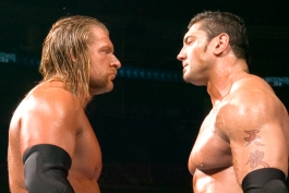 باتیستا - تریپل-اچ - رسلمنیا-۲۱ - قهرمانی-سنگین‌وزن - WWE - نبرد-تاریخی - Evolution - مسابقه-خاطره‌انگیز