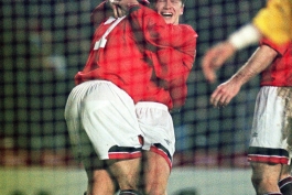 Beckham celebrates his goal against Galatasaray in the Champions League in 1994 with team-mate Eric Cantona