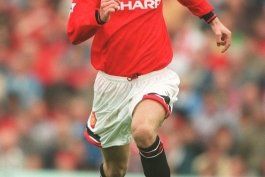 In action for Manchester United, September 1995