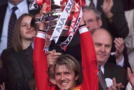 Lifting the FA Cup for United in 1999, after a 2-0 win against Newcastle United