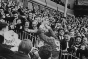 Liverpool centre-forward Ian St John is cheered by fans as he leaves the field after his team beat Chelsea 2-0 in the F.A. Cup semi-final at Villa Park, Birmingham, 28th March 1965. (Photo by Keystone/Hulton Archive/Getty Images)